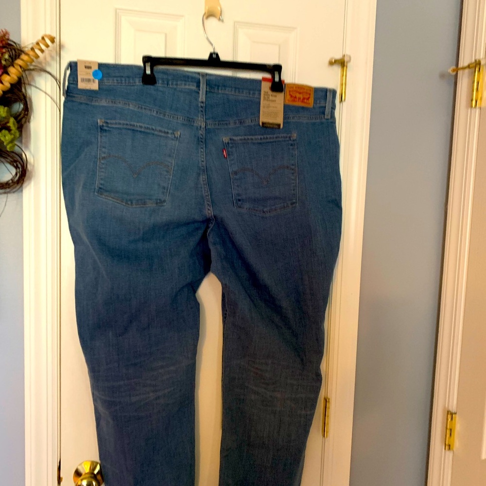 724 High Rise Slim Straight Leg Jeans